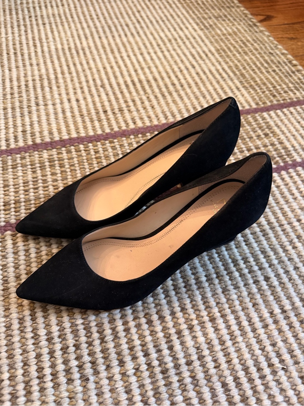 Women’s Black suede Marc Fisher heels with pointed toe.